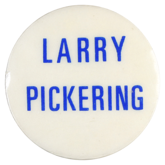 This badge was worn by supporters of cartoonist Larry Pickering, who was the Liberal candidate for the ACT seat of Fraser at the 1974 federal election. Pickering was unsuccessful in his bid to enter parliament.