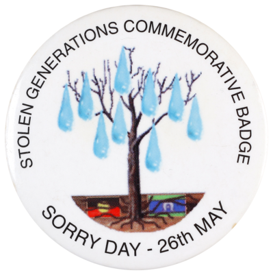 This badge was produced to celebrate National Sorry Day, held on 26 May since 1998 to express regret for the forced removal of Aboriginal and Torres Strait Islander children from their families which was government policy between 1909 and 1969. The generations of children who were removed from their families have become known as the Stolen Generations.