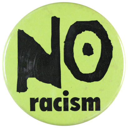 This badge was produced in the 1990s to protest against racism.