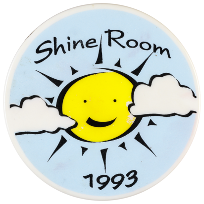 This badge was created to celebrate the opening of the Shine Room at Burwood Local Court, NSW, in 1993. The room was the idea of the Clerk of the Court, Bill Wheeler, and was a safe space for victims and their families before giving evidence.