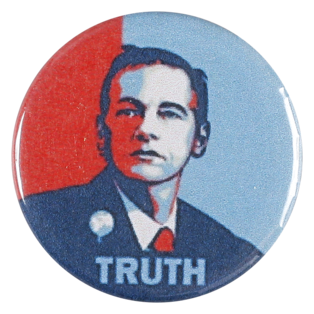This badge was produced in 2010 in support of internet-based organisation WikiLeaks and its editor-in-chief, Australian journalist and activist Julian Assange.