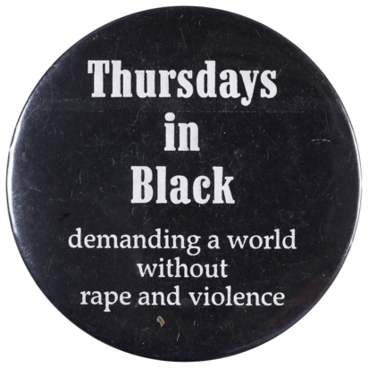 This badge was produced in support of Thursdays in Black, an international movement formed to raise awareness of violence against women.